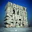 A massive, 3D concrete block sculpture stacked to spell Danny Byrd Supersized,” on the floor with a tiny man at its base looking up.